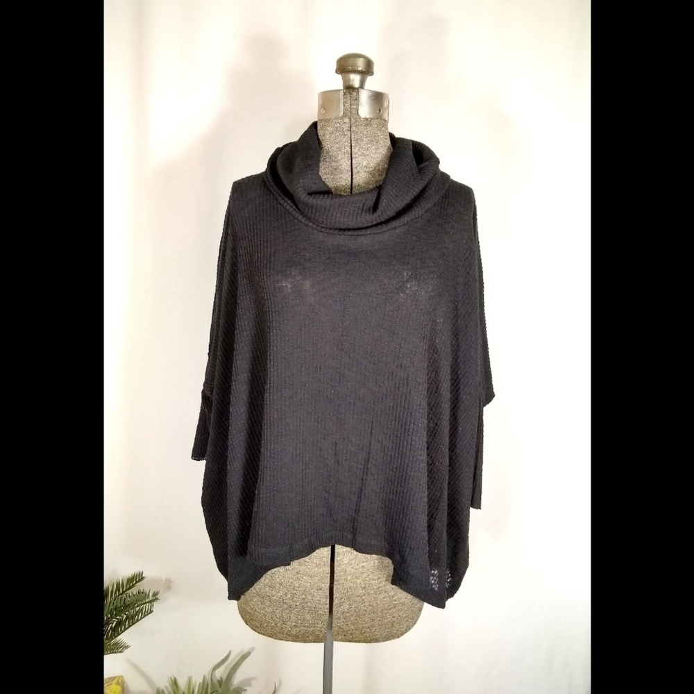FP Beach black oversized split back short sleeve turtleneck top